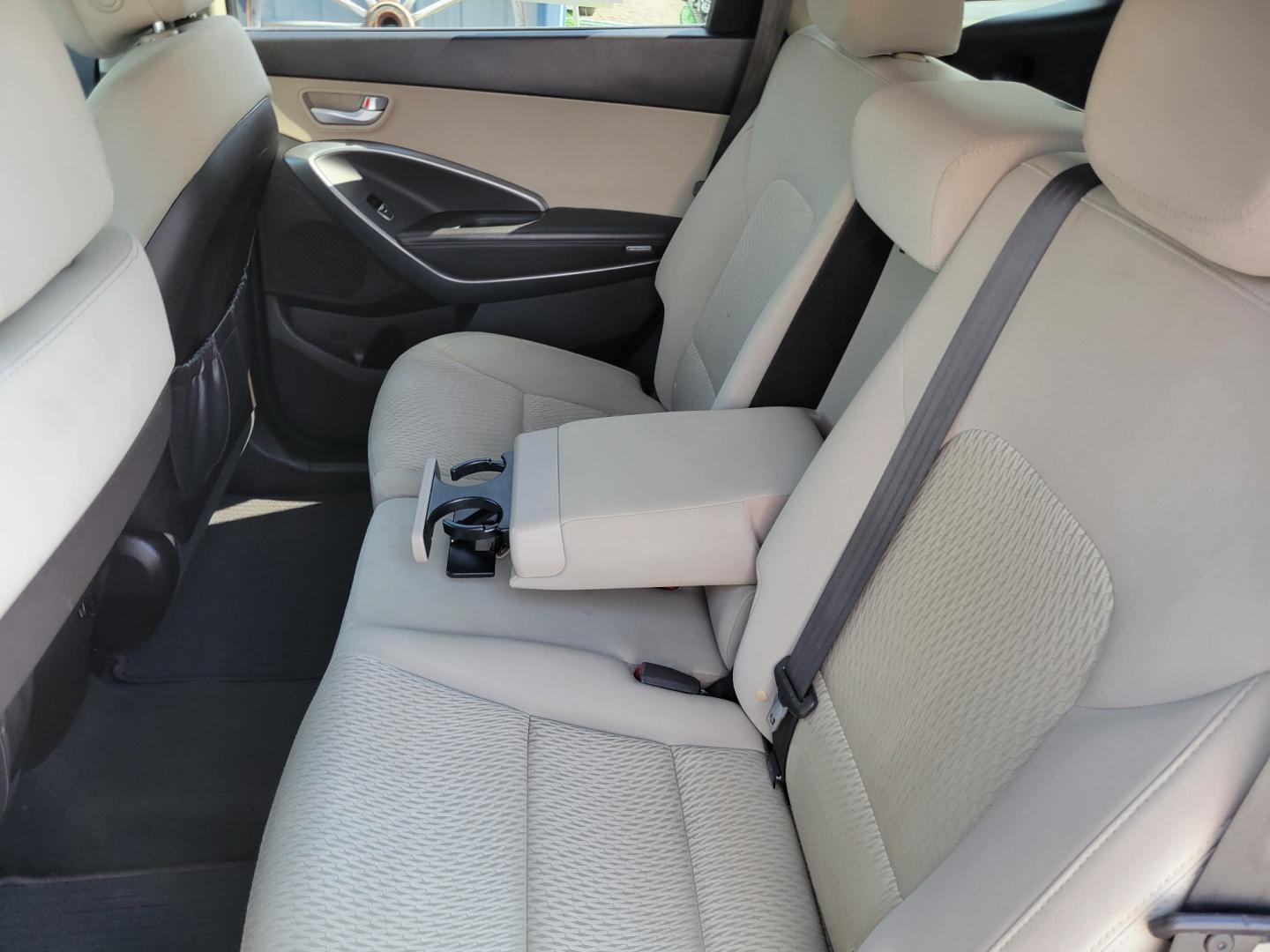 2015 Brown /Tan Hyundai Santa Fe GLS (KM8SMDHF7FU) with an 3.3L V6 engine, 6 Speed Auto transmission, located at 450 N Russell, Missoula, MT, 59801, (406) 543-6600, 46.874496, -114.017433 - Photo#12